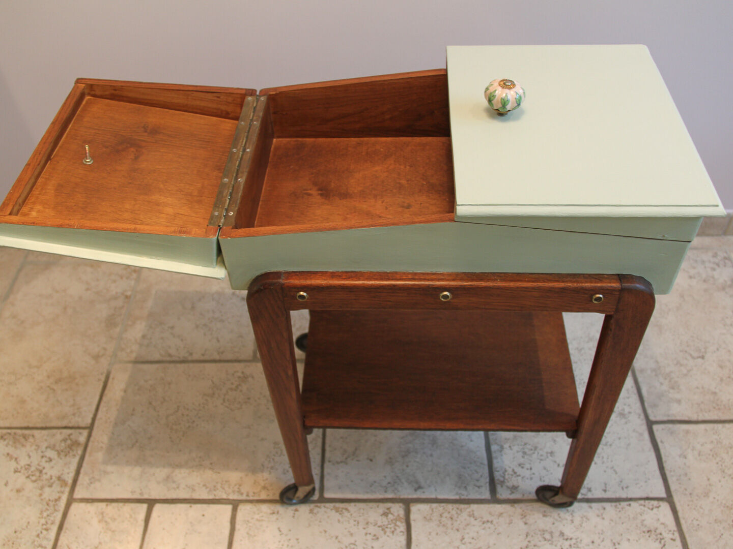 Worker green wood feet wheels