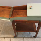 Worker green wood feet wheels