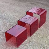 Set of 3 nesting tables in red plexiglass from the 70-80s