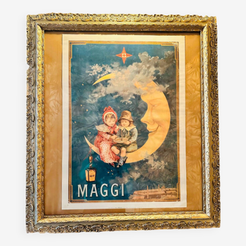 Large old golden frame with vintage Maggi poster