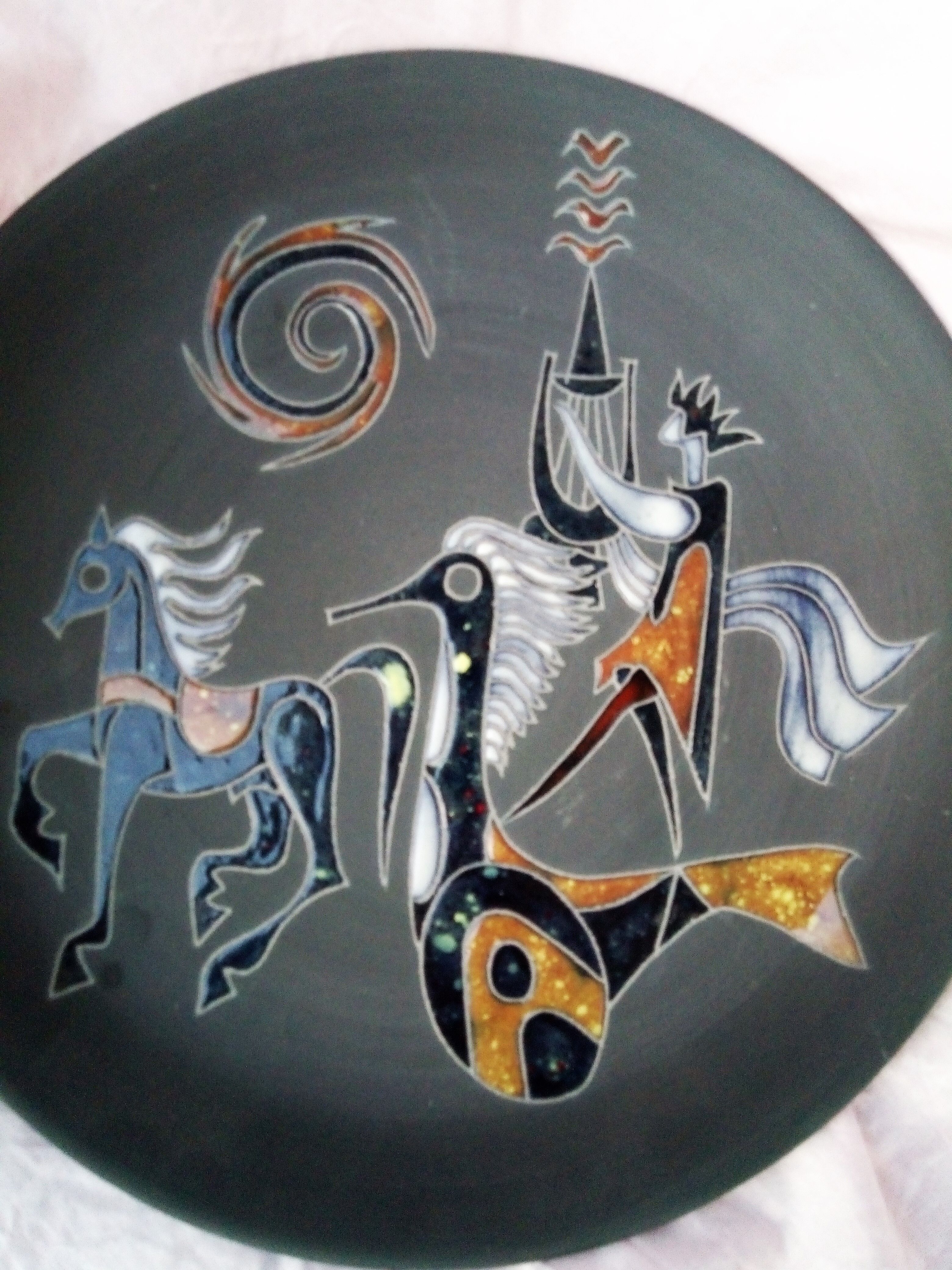 Rare pair of ceramic plates and enamel with mythological decoration. The 50s.