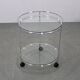 Mid-century round serving table, chrome and glass, Italy, 1980s
