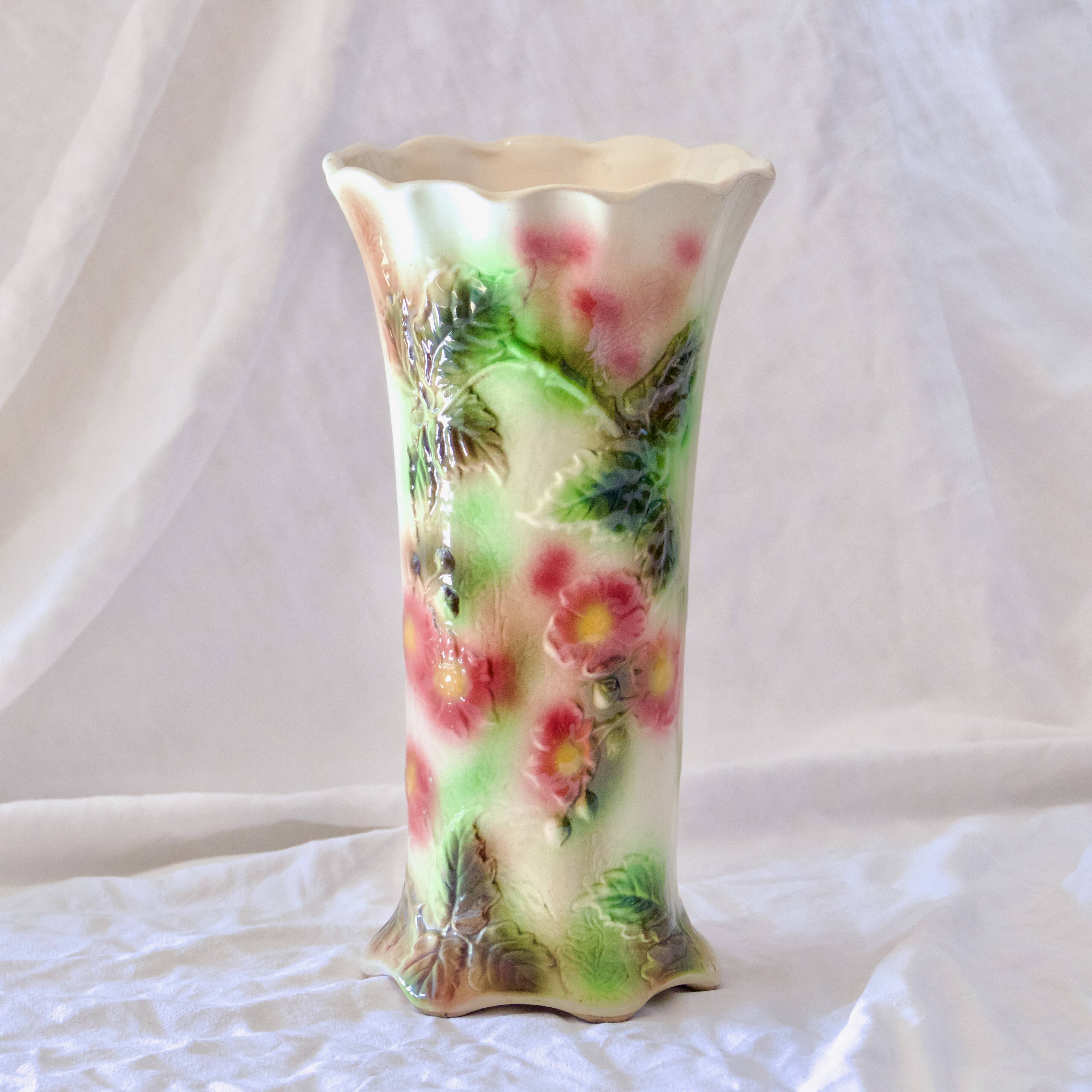 Antique Saint Clément slip roller vase with bird decor