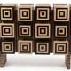 A low Art Deco buffet in two-tone relief marquetry.