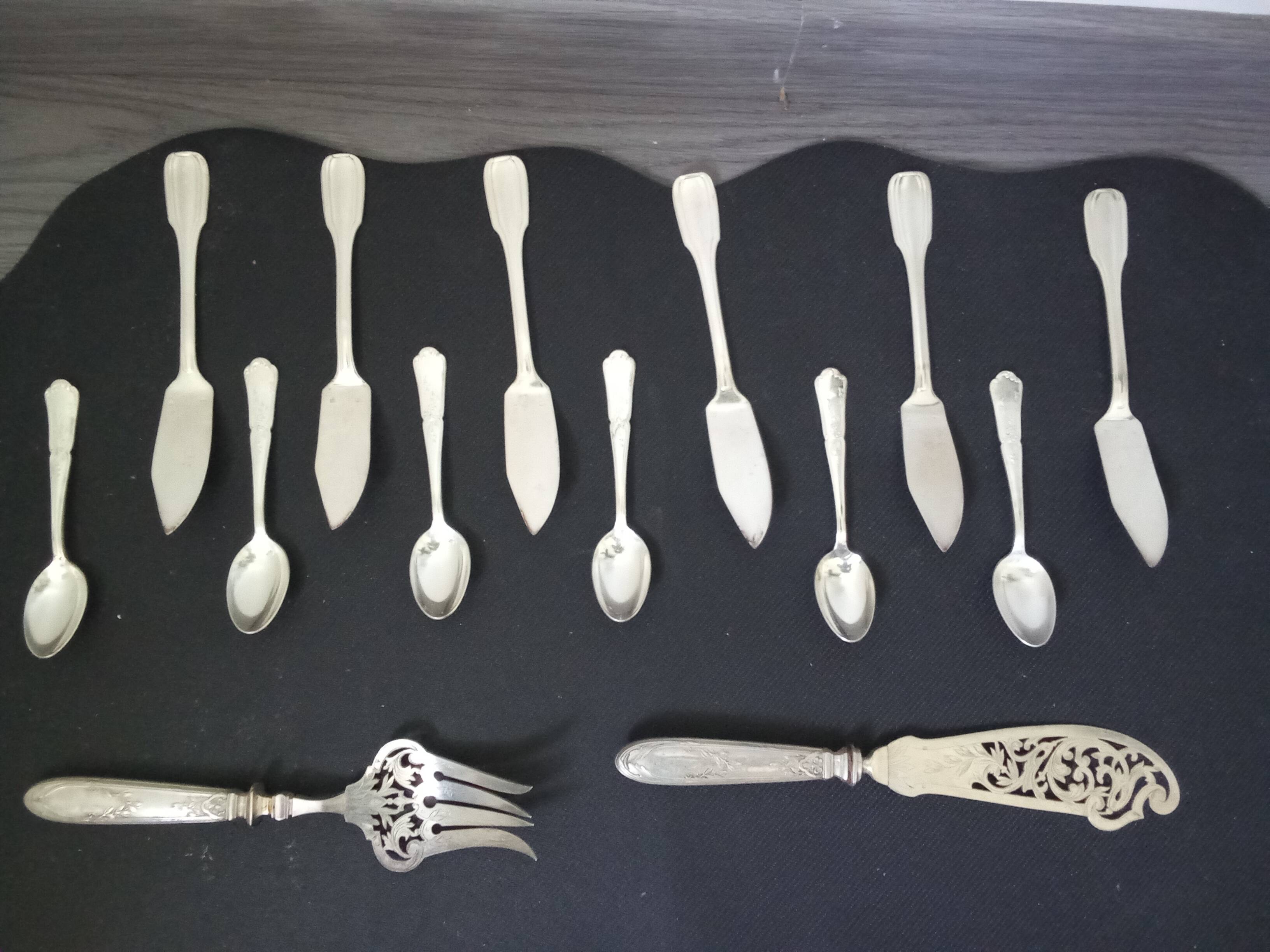 200 pieces of Russian silverware (spoons, forks and knives).