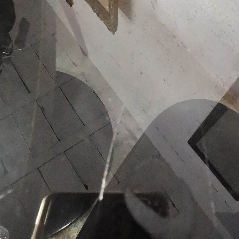 Vintage tulip foot table and smoked glass