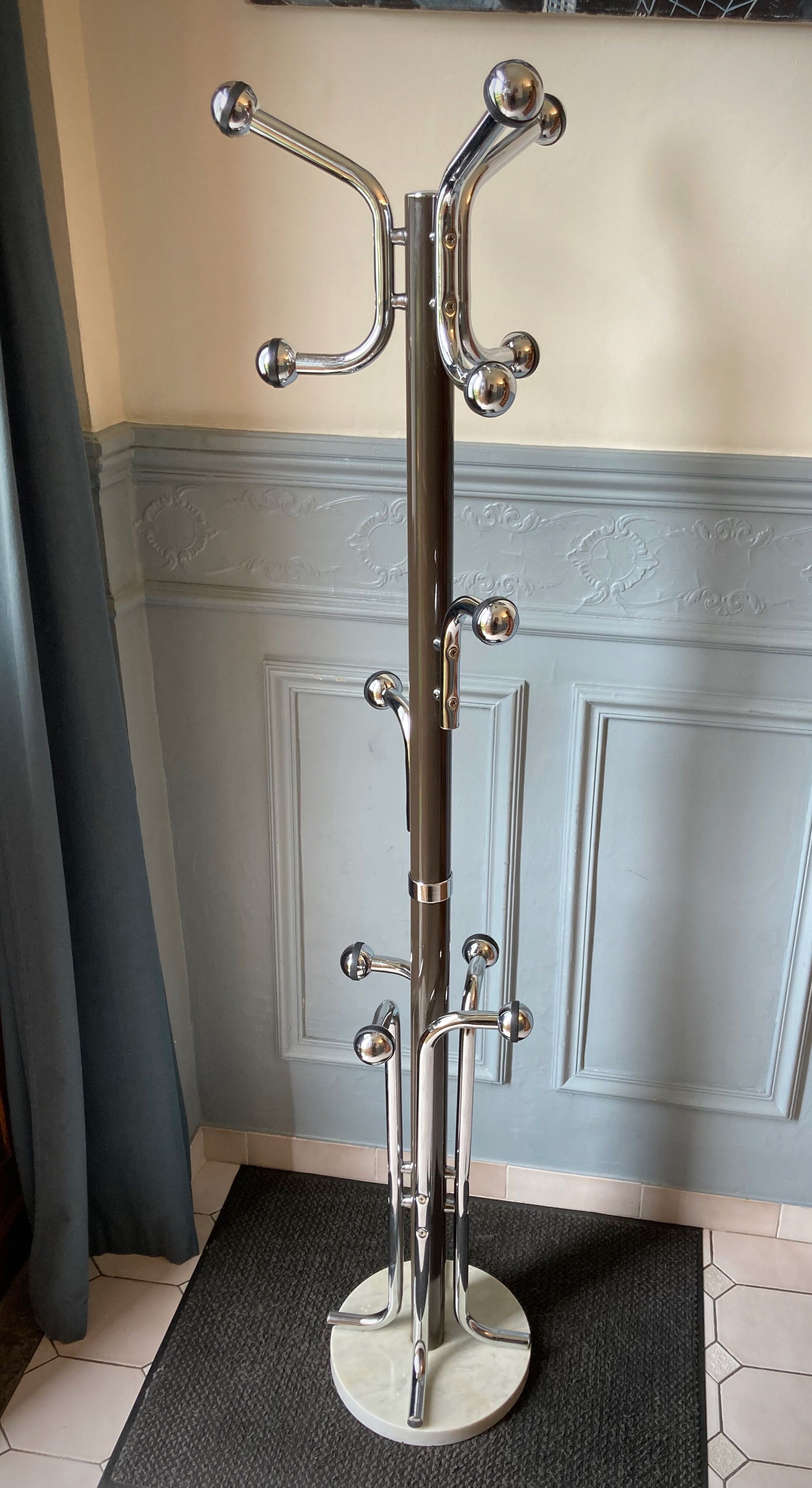 Coat rack on vintage stand
