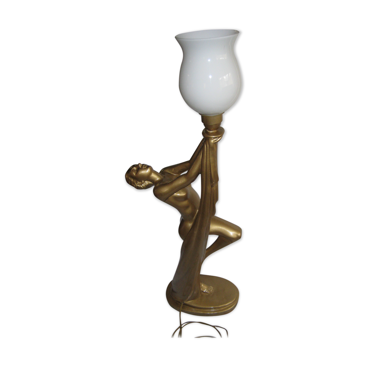 Lamp depicting a with a drape