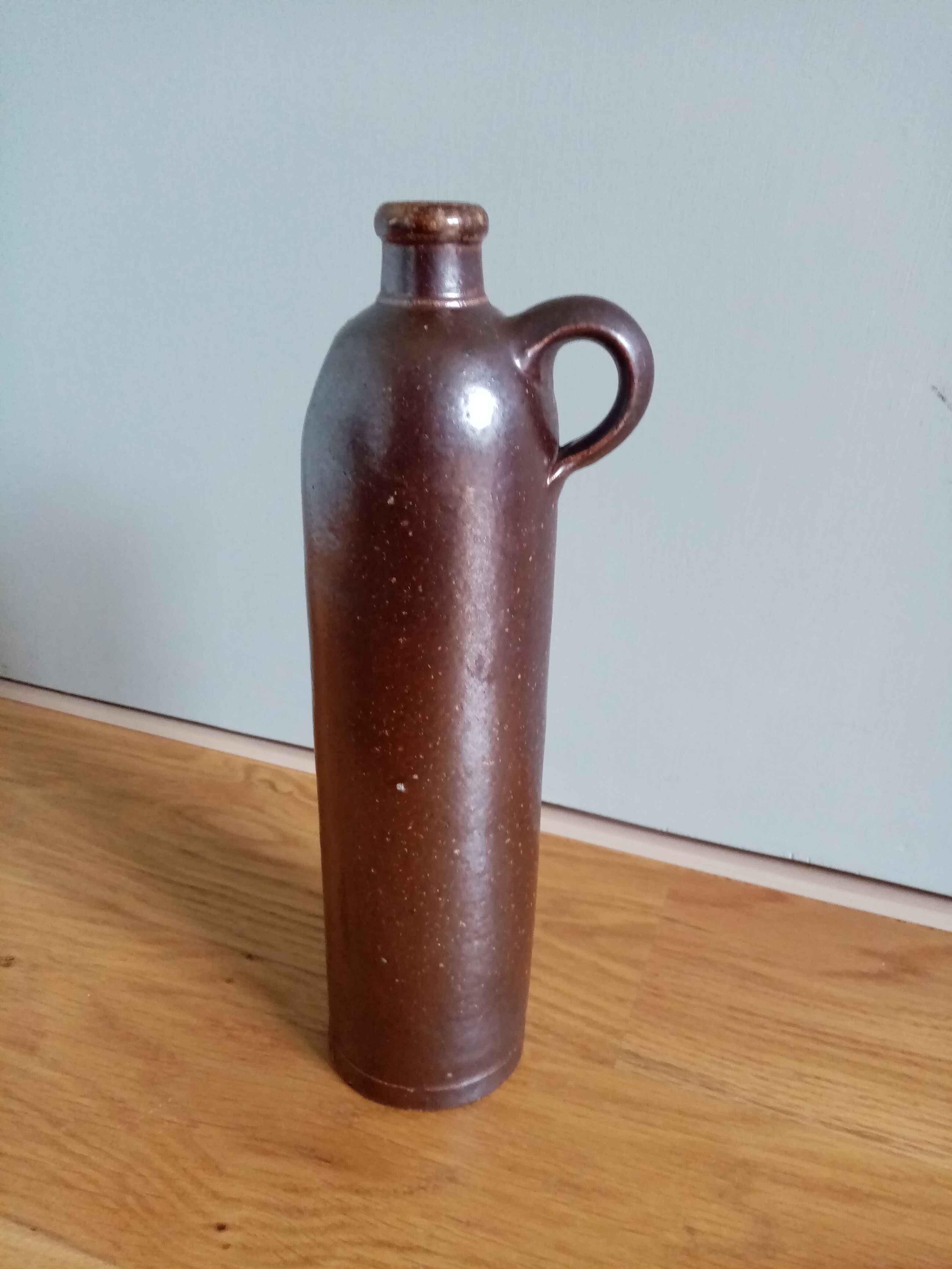 High bottle with brown enamelled sandstone handle Amsterdam
