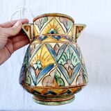 Antique majolica water pitcher made in Italy and hand painted.