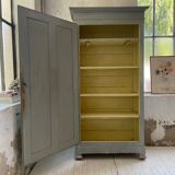 Blue patinated cap cabinet
