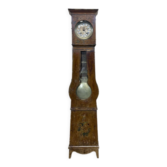 Nineteenth century clock in fir, clock face with enamelled numerals