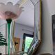 Octagonal mirror with brass parcloses by Jan Deknudt