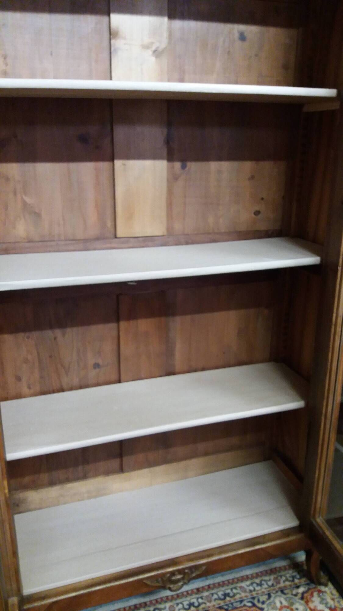 Two-door display cabinet in transitional style.