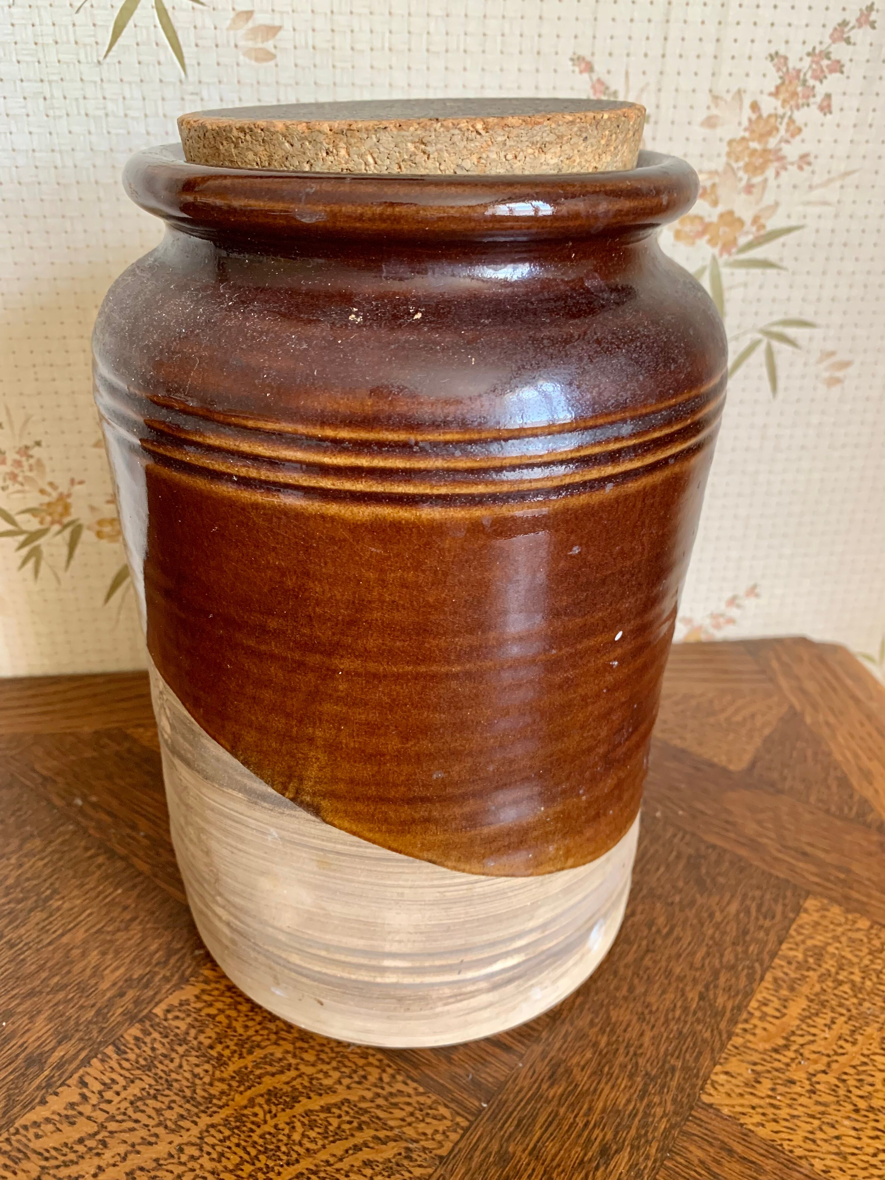 Old sandstone pot with cork lid
