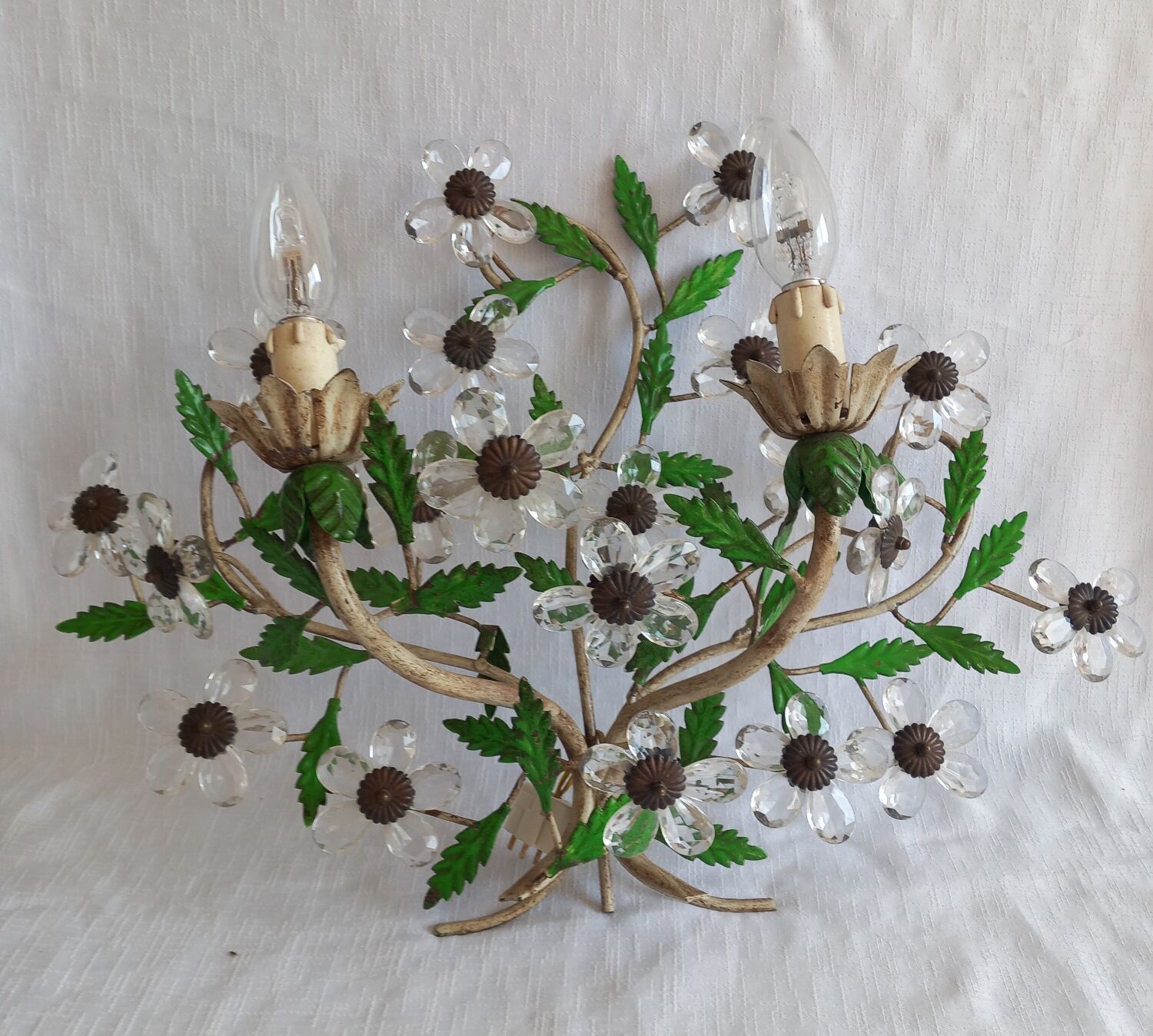 Pair of Italian Florentine wall sconces in tin and glass.