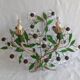 Pair of Italian Florentine wall sconces in tin and glass.
