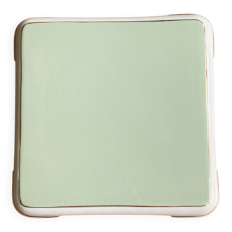 Important vintage trivet in celadon green faience by Villeroy & Boch.