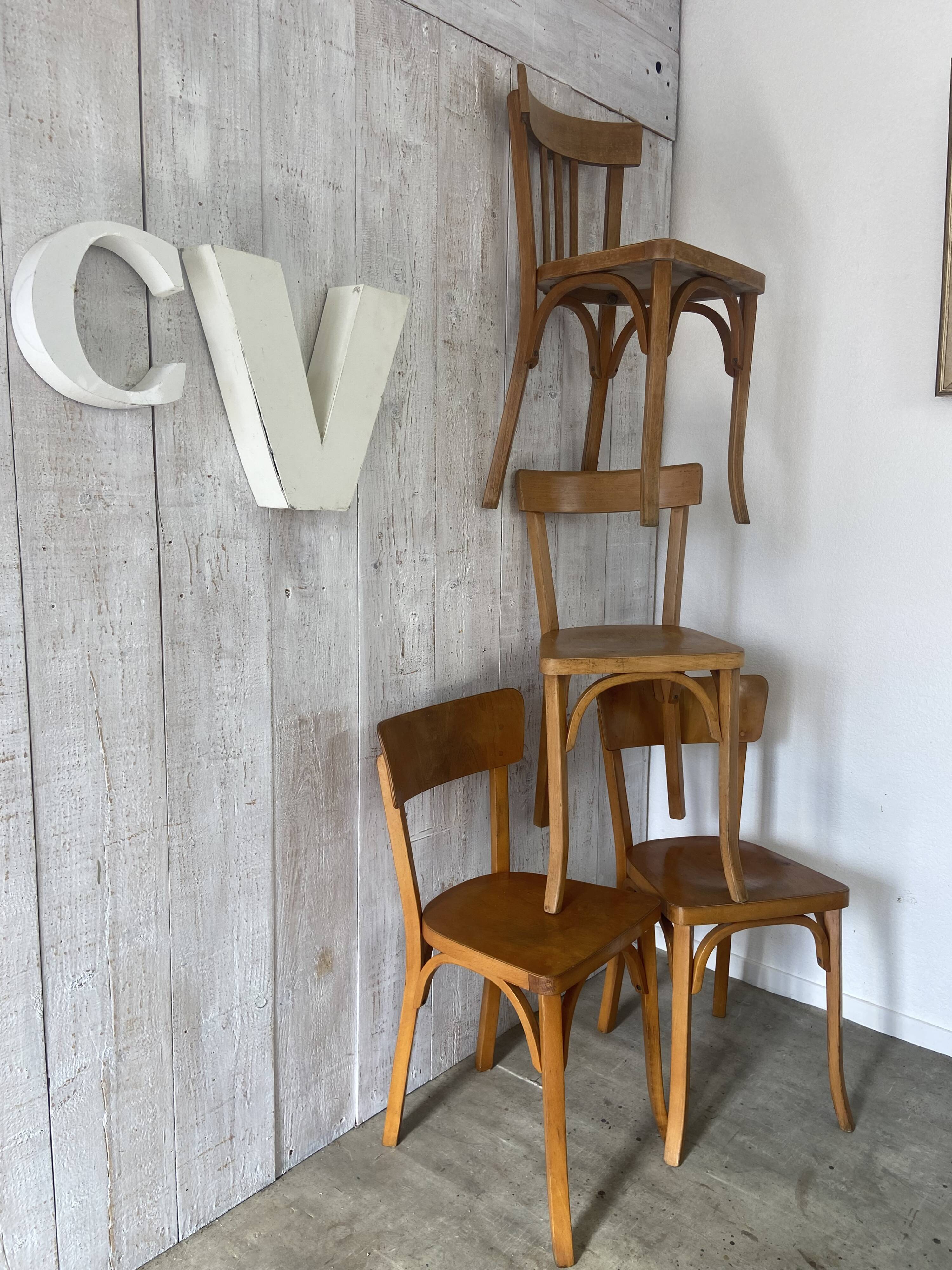 Mismatched Baumann bistro chairs