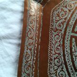 Old oriental tray in chiseled copper