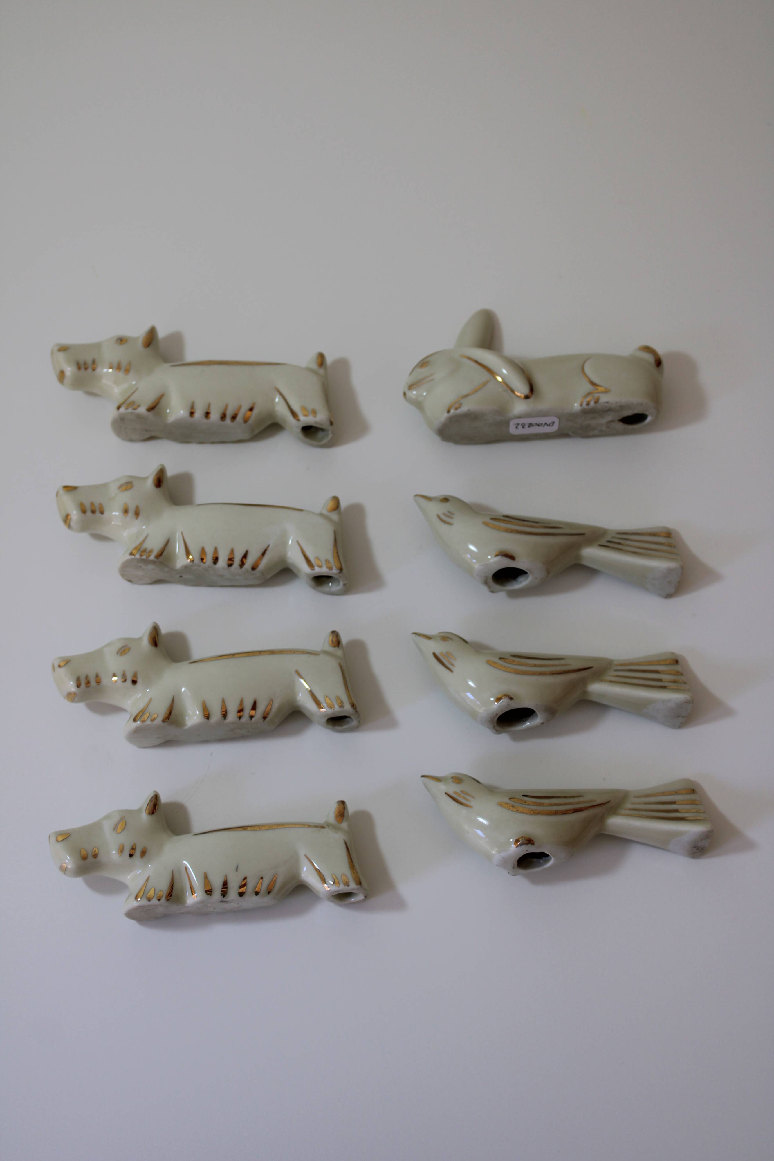 8 portes couteaux animaux porcelaine de Limoges vintage