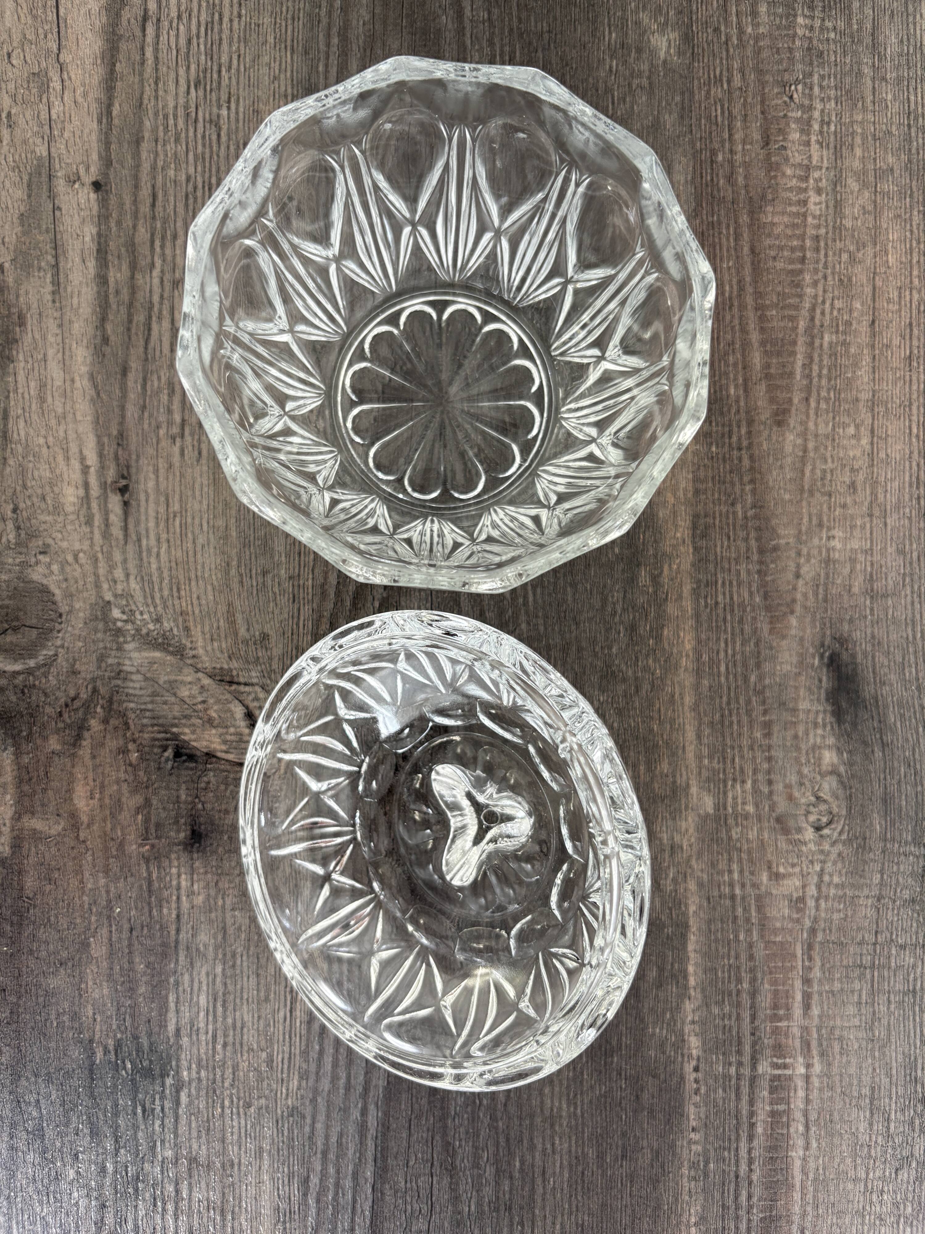 Antique covered jar in chiseled glass