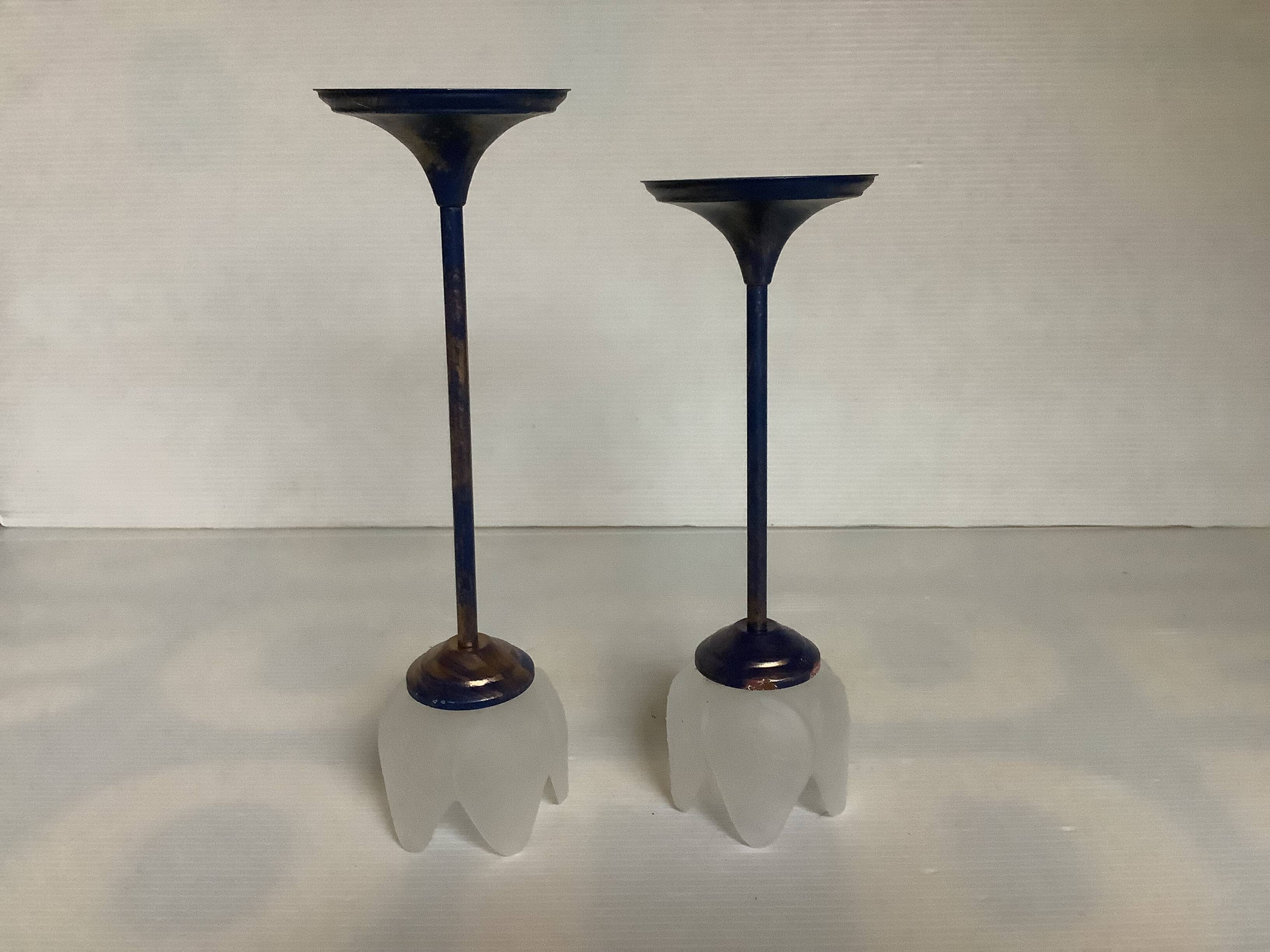 Pair of glass and metal flower candlesticks