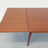 Vintage Scandinavian style dining table from the 50s and 60s in teak with extensions