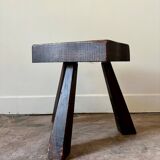 Brutalist tripod stool in dark wood