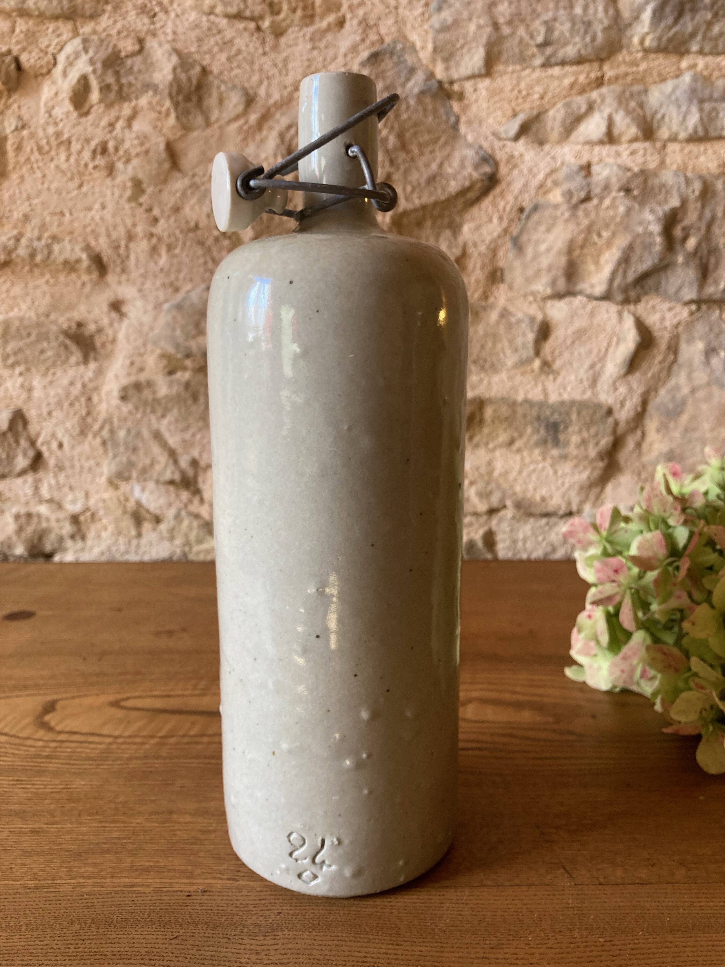 Bouteille bouillotte en grès émaillé gris clair