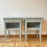 Pair of curved bedside tables