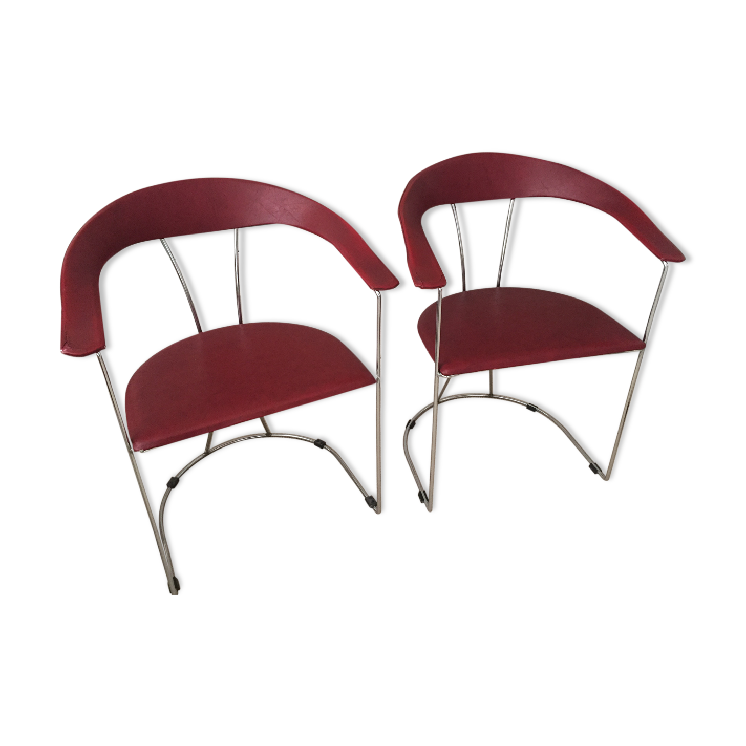 Pair of red chairs in 80s skai