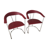 Pair of red chairs in 80s skai