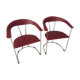 Pair of red chairs in 80s skai