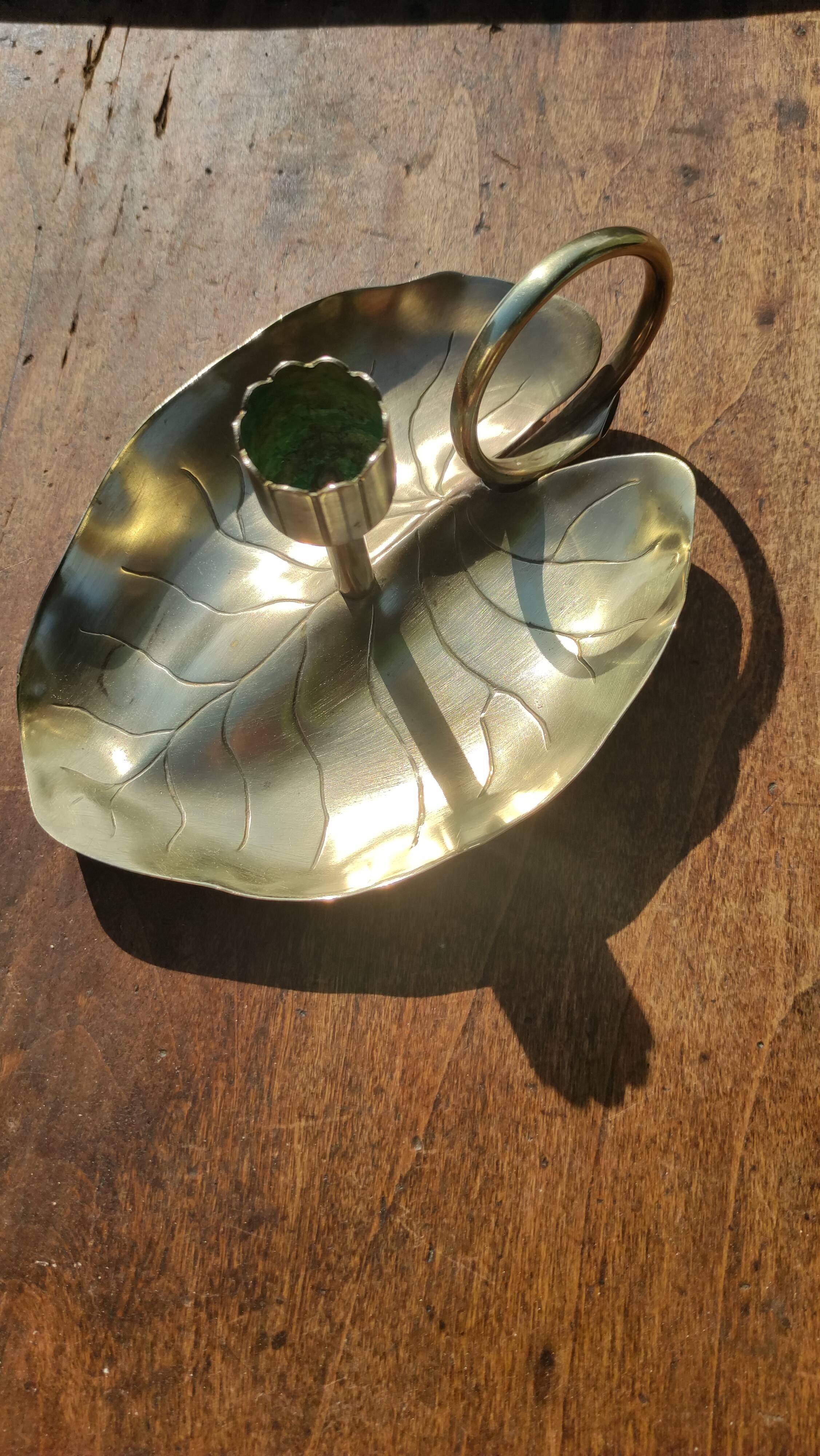 Vintage candle holder in golden brass