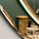 1970s Italian oval mirror by Crystal Arte with faceted glass frame