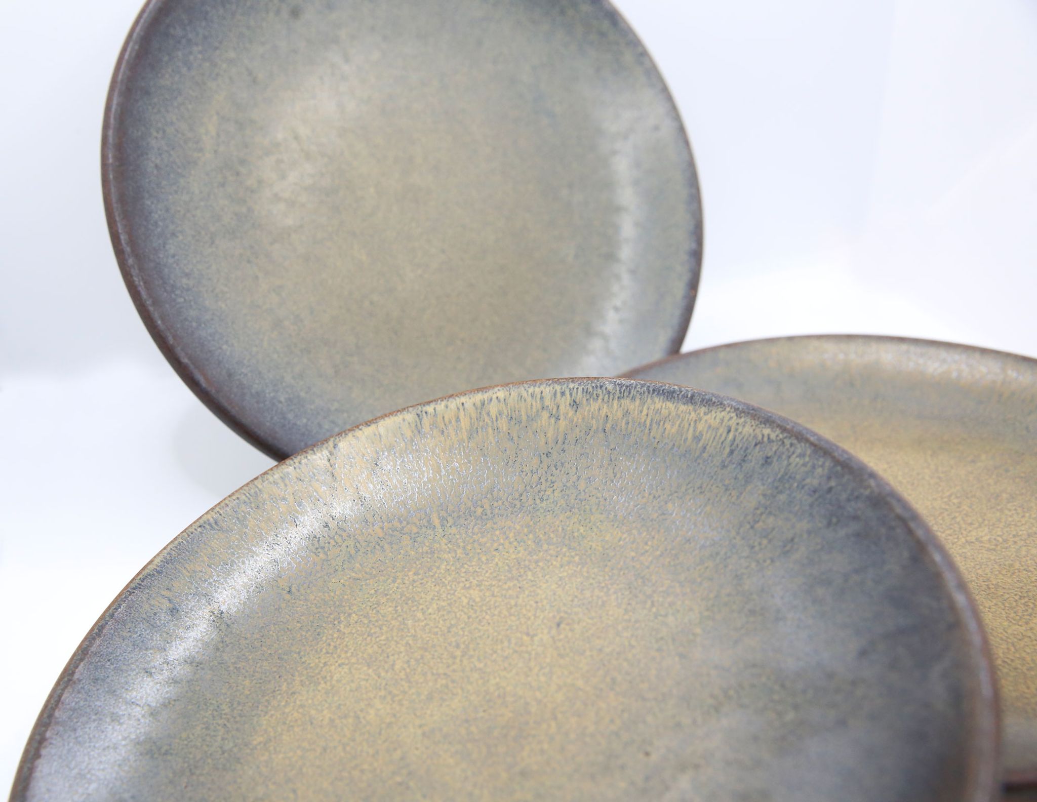 Set of 3 bluish and ochre plates in stoneware Arts Ceram Grand Feu