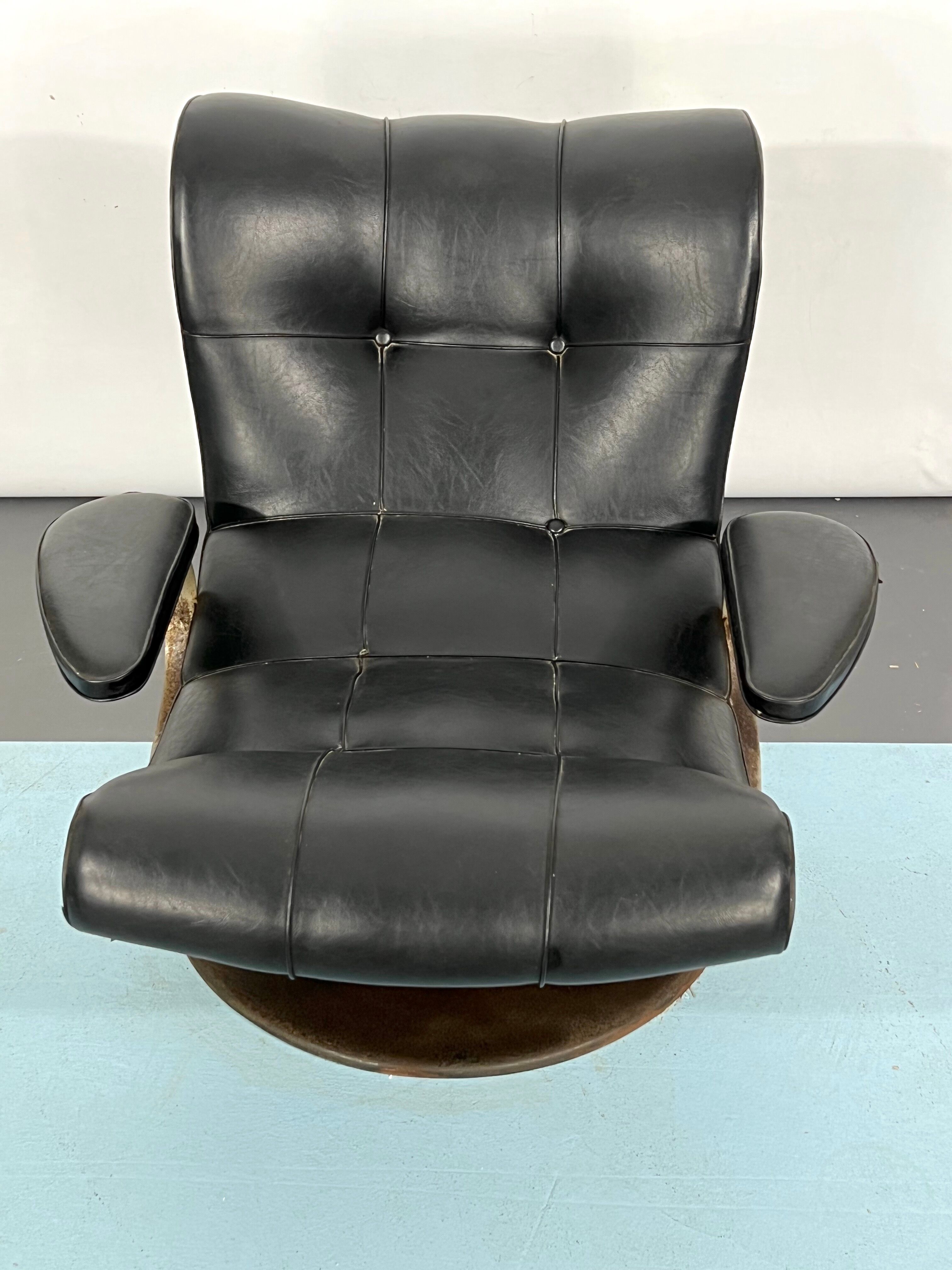 Vintage Italian black swivel armchair from 60s