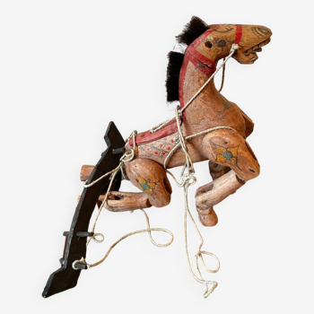 Wooden puppet horse