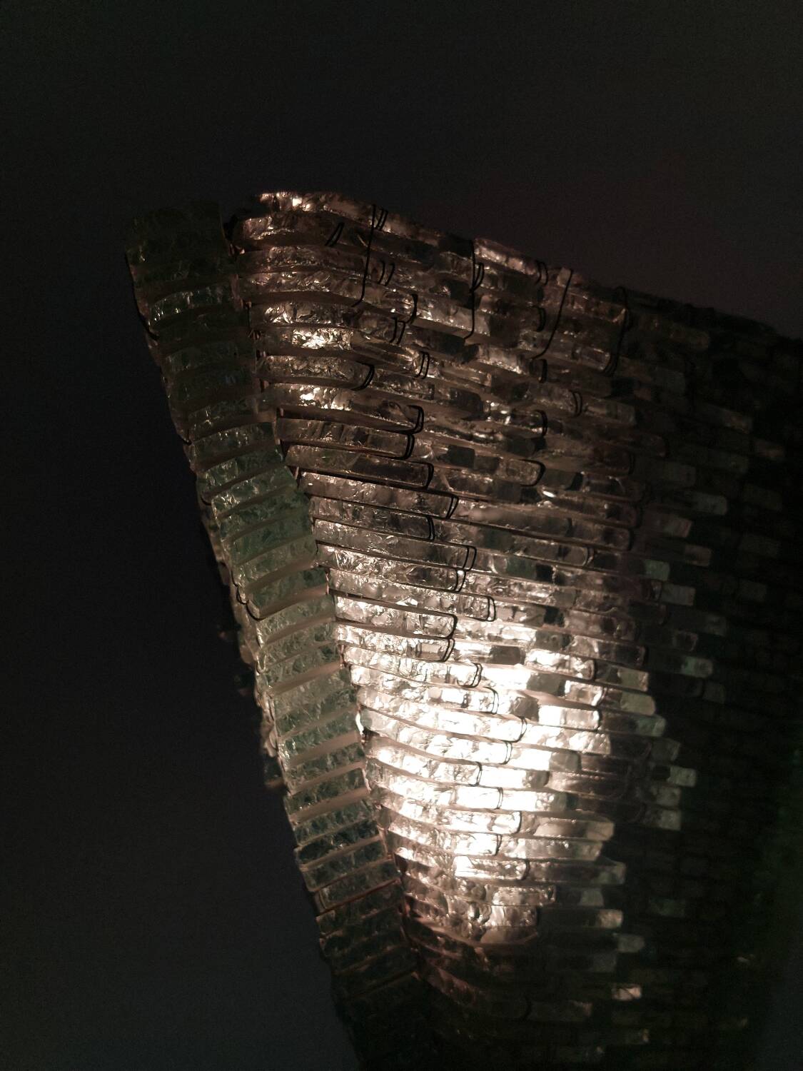 Pair of pyramid-shaped wall sconces in glass in vintage French style.