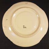 4 Quimper earthenware saucers or plates