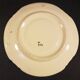 4 Quimper earthenware saucers or plates