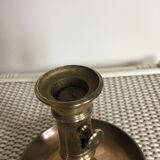 Old brass candlestick called "rat tail"