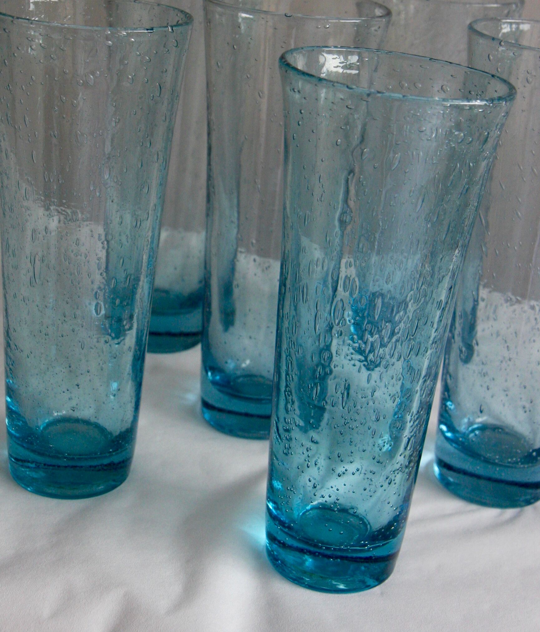 Six Biot glass orange glasses