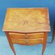 Pair of neoclassical solid wood bedside tables