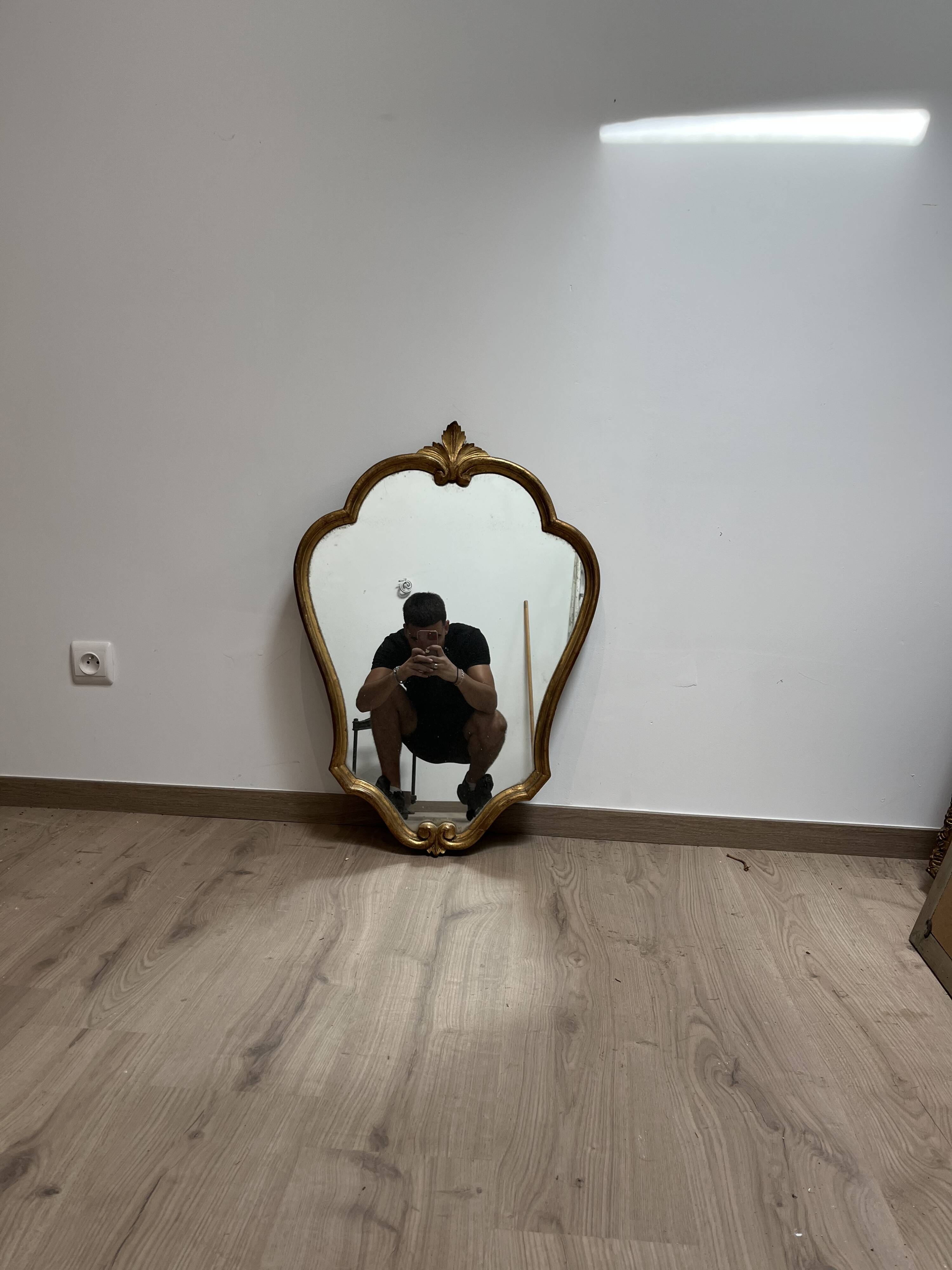 Mirror in wood and gilded stucco, 19th century