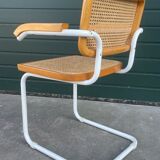 Cesca model B64 chair with armrests in white Design