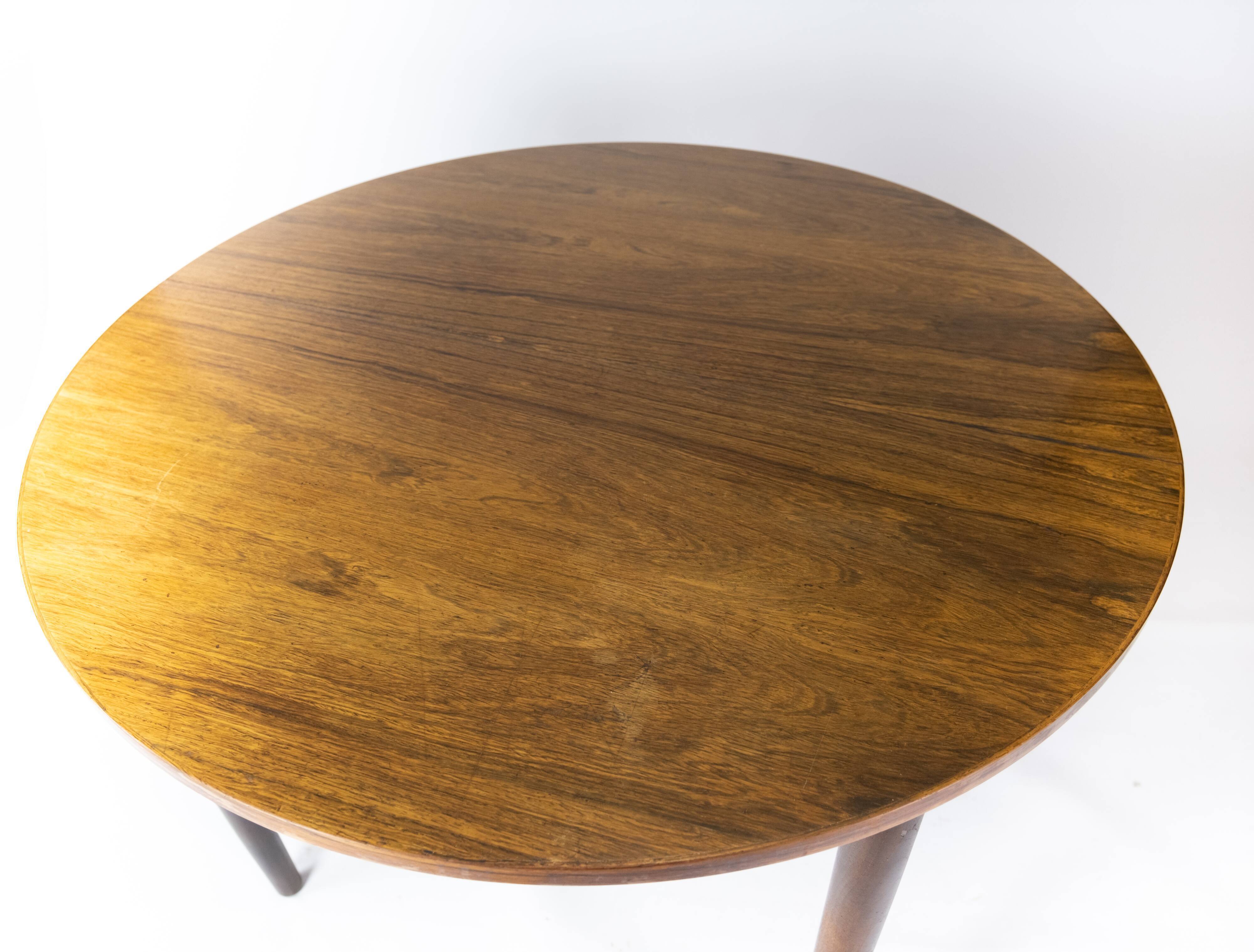 Dining table in rosewood of danish design from the 1960s