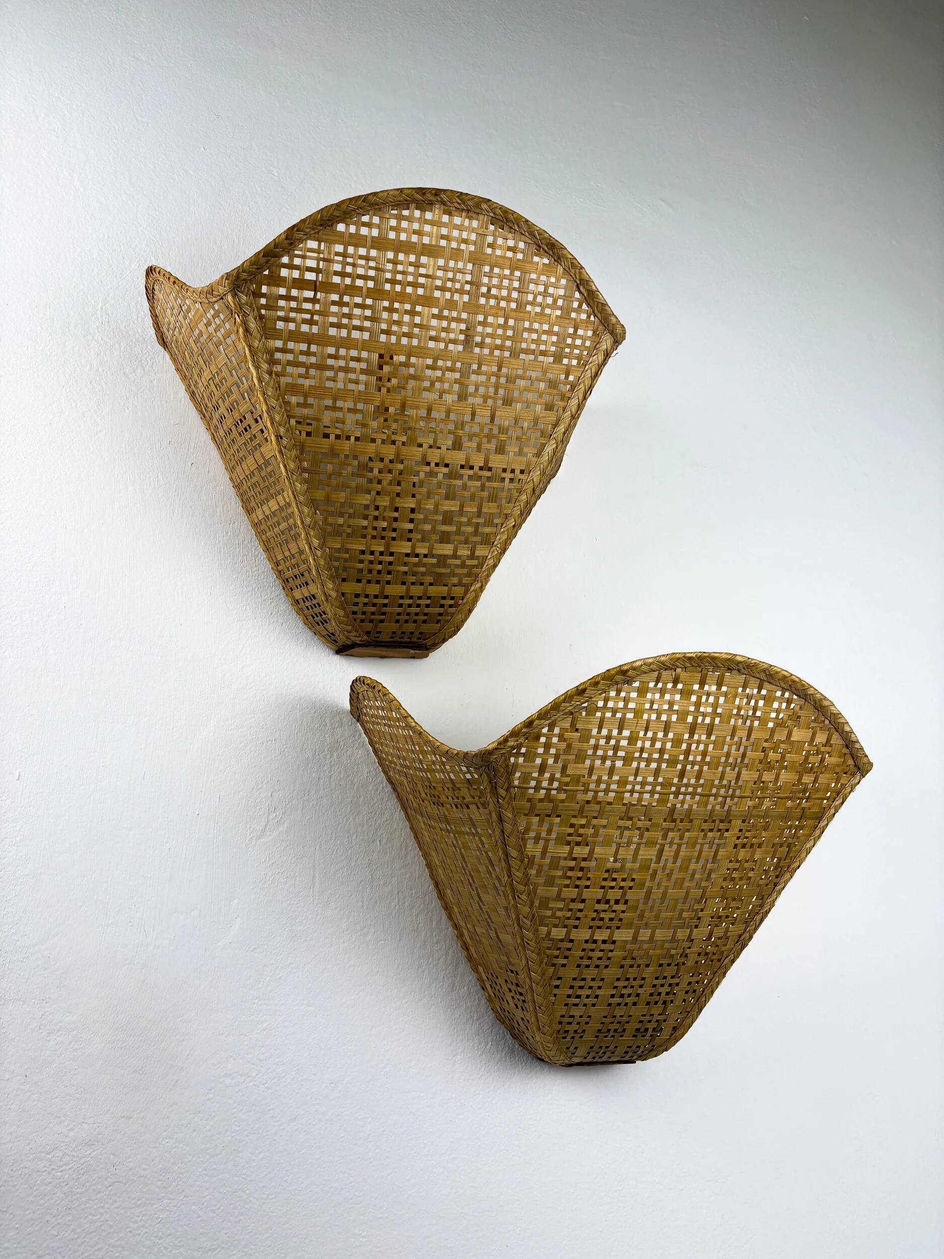 Pair of scalloped rattan wall sconces, sourced in Spain, 1980s