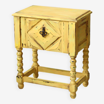 Large yellow patinated bedside table